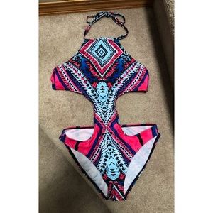 One piece swimsuit with open sides